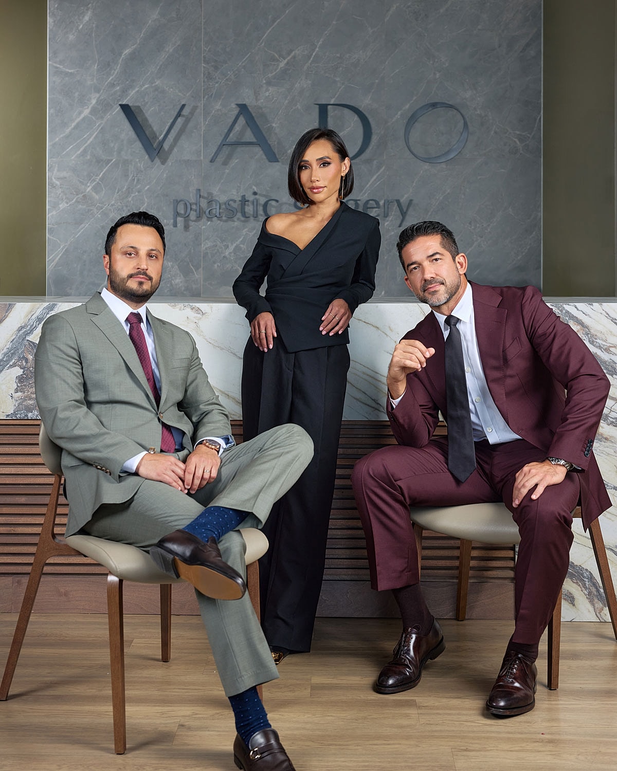 orlando plastic surgeons standing in front of their practice