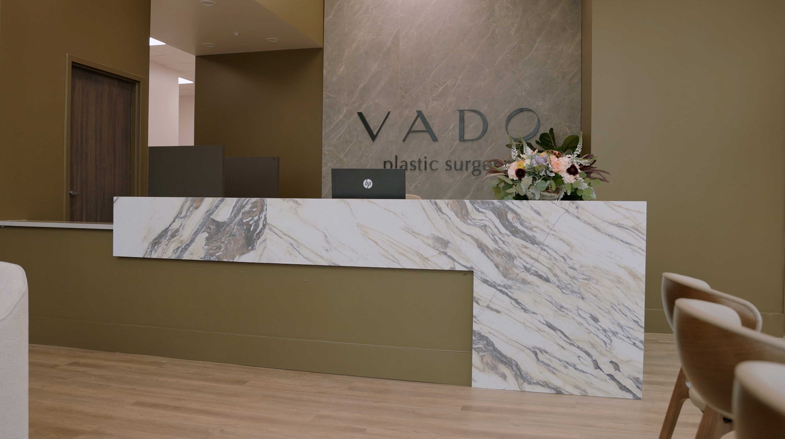 Modern plastic surgery clinic reception area.
